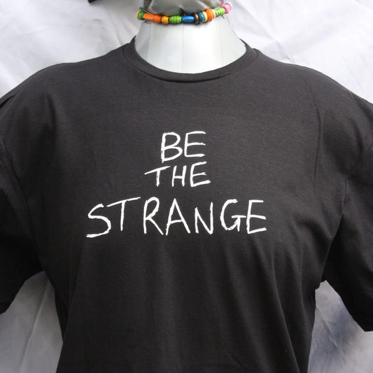 Be the strange t-shirt, hand scrawled and as beautiful as you are. By ElRat Designs
