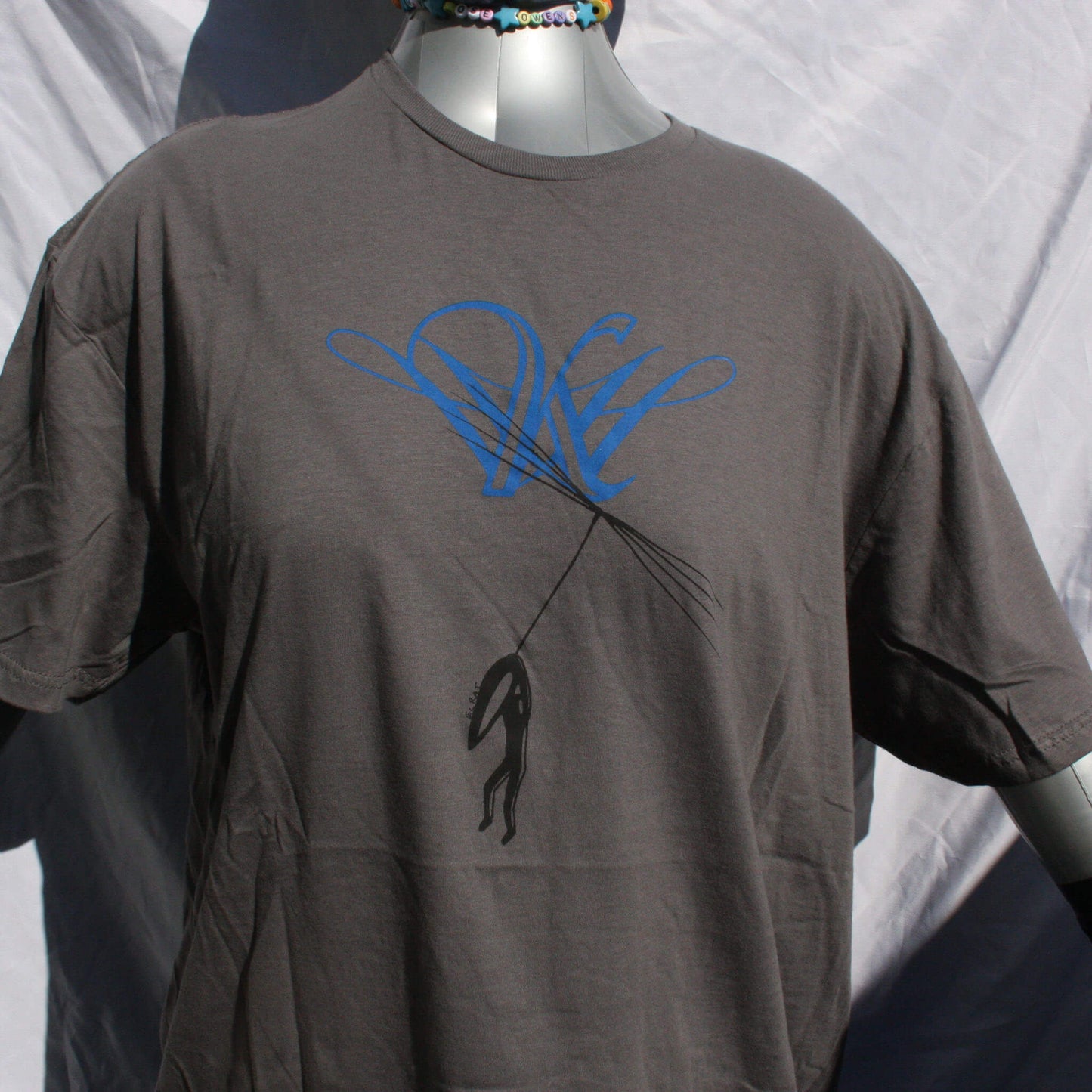 Dandelion Hope t-shirt with Kristin Hersh inspired design, screen printed on a comfortable cotton tee charcoal close