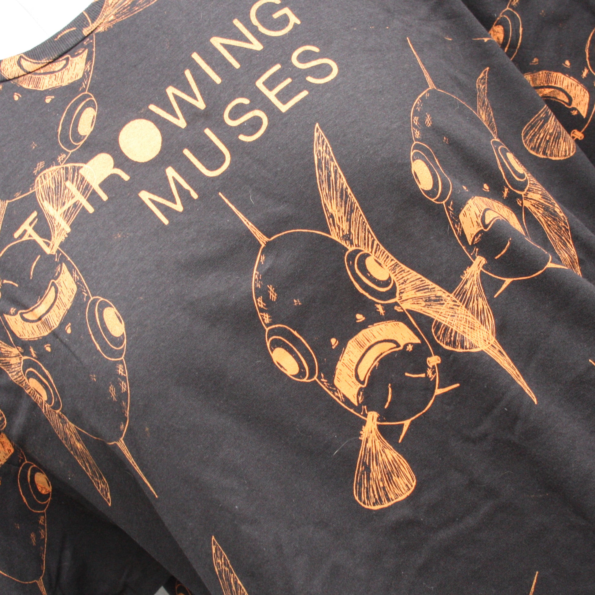 Throwing Muses 'Bywater' T-Shirt - black with orange messy print, unique 'Schooling Edition,' handmade by ElRat Designs (bywater_schooling_close_1).