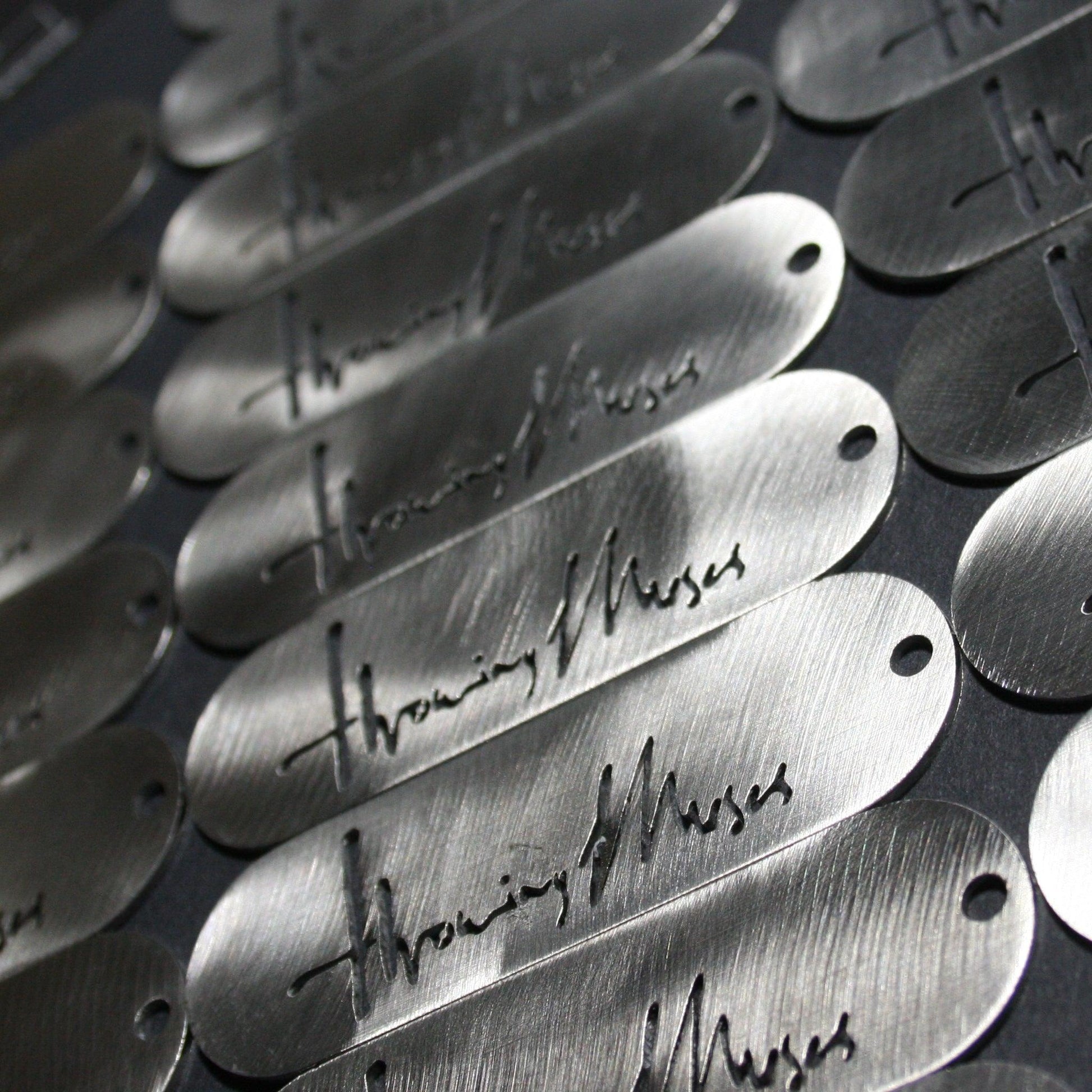 hrowing Muses 1986 logo CNC laser-cut stainless steel keyring, designed by ElRat Designs; a unique piece for fans of Kristin Hersh and alternative rock.