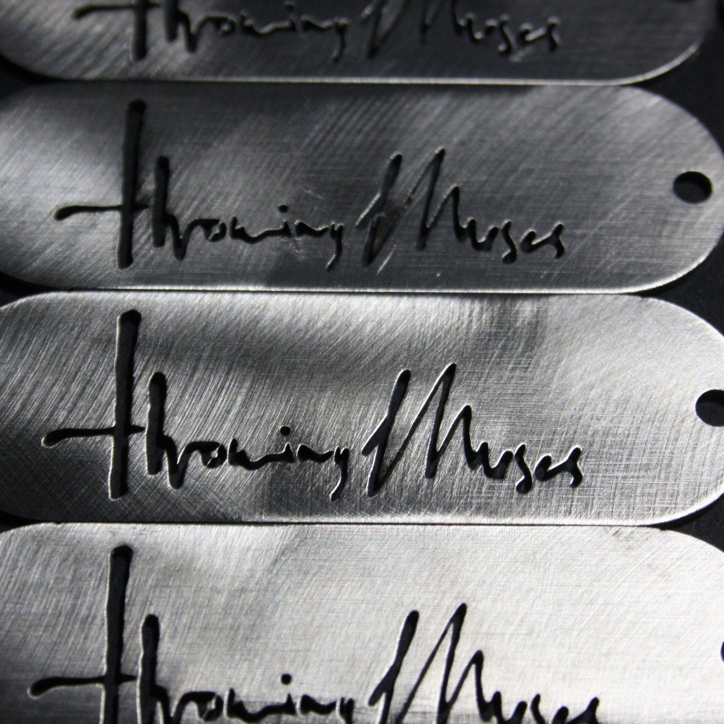 hrowing Muses 1986 logo CNC laser-cut stainless steel keyring, designed by ElRat Designs; a unique piece for fans of Kristin Hersh and alternative rock.