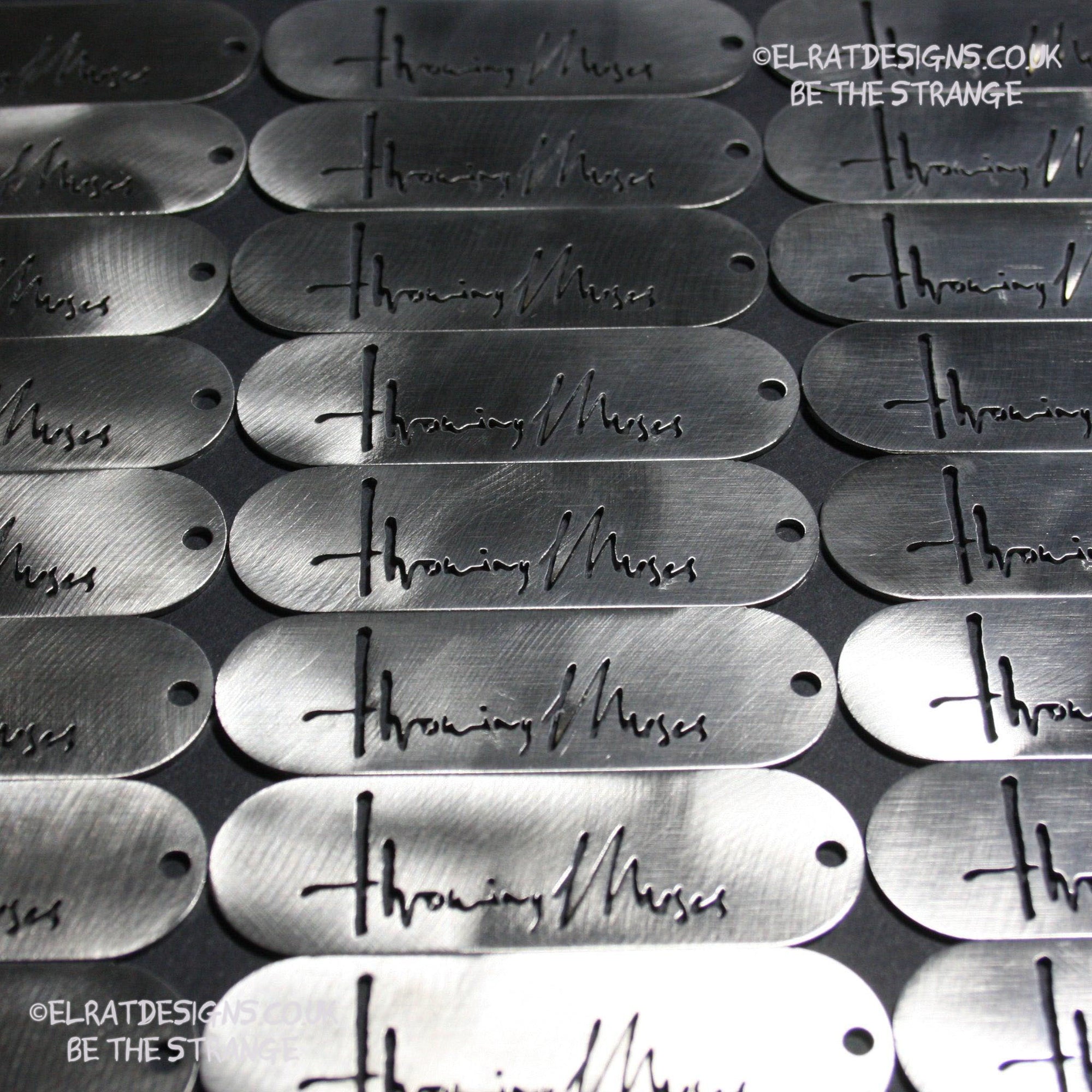 Throwing Muses 1986 logo CNC laser-cut stainless steel keyring, made in the UK from scrap for ElRat Designs - elratdesigns.co.uk