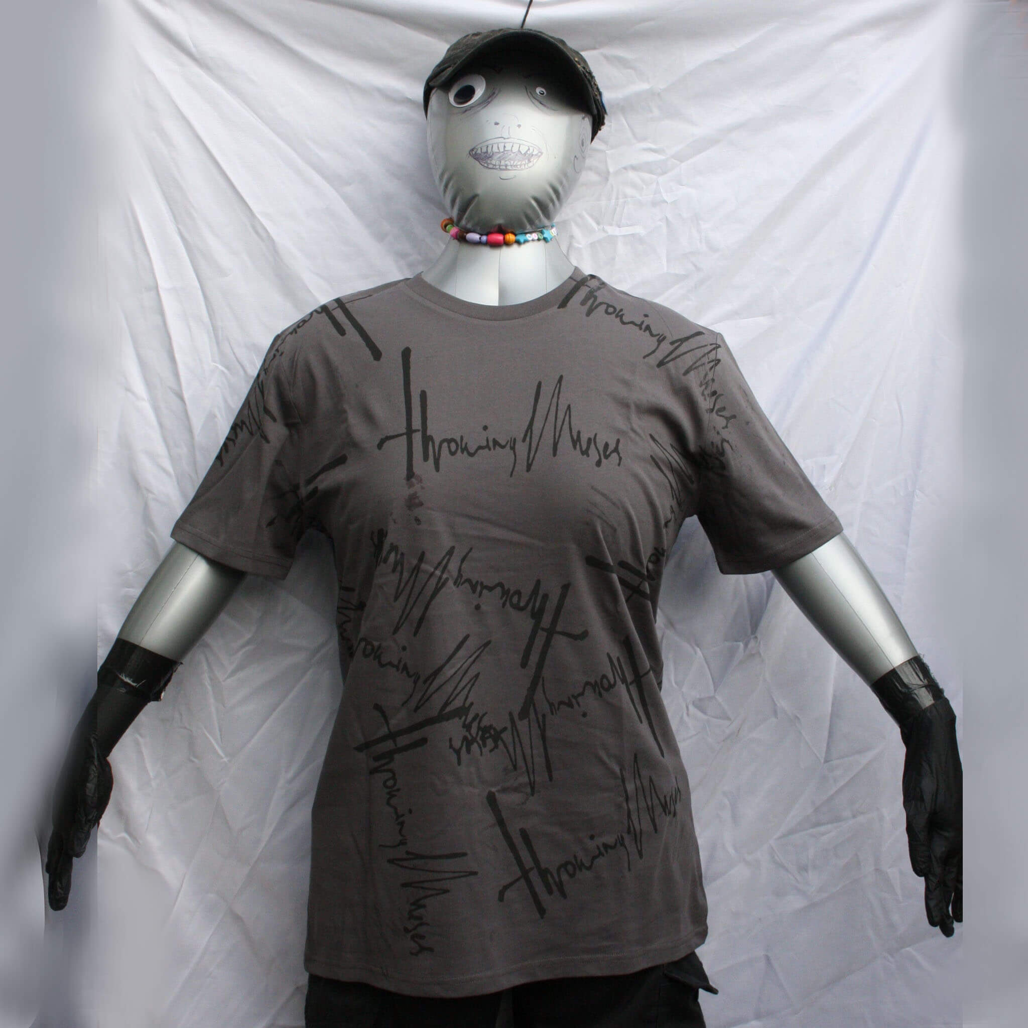Front view of Throwing Muses 1986 logo messy print T-shirt in charcoal with black print ��� one-of-a-kind design by ElRat Designs