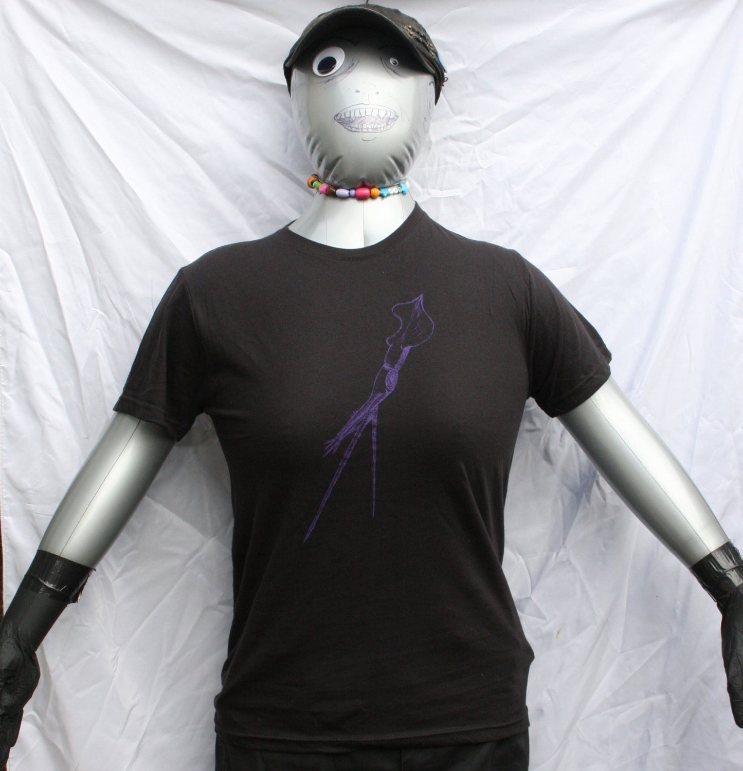 Black T-shirt featuring a hand-drawn whiplash squid design, with intricate tentacle details and artistic lines.