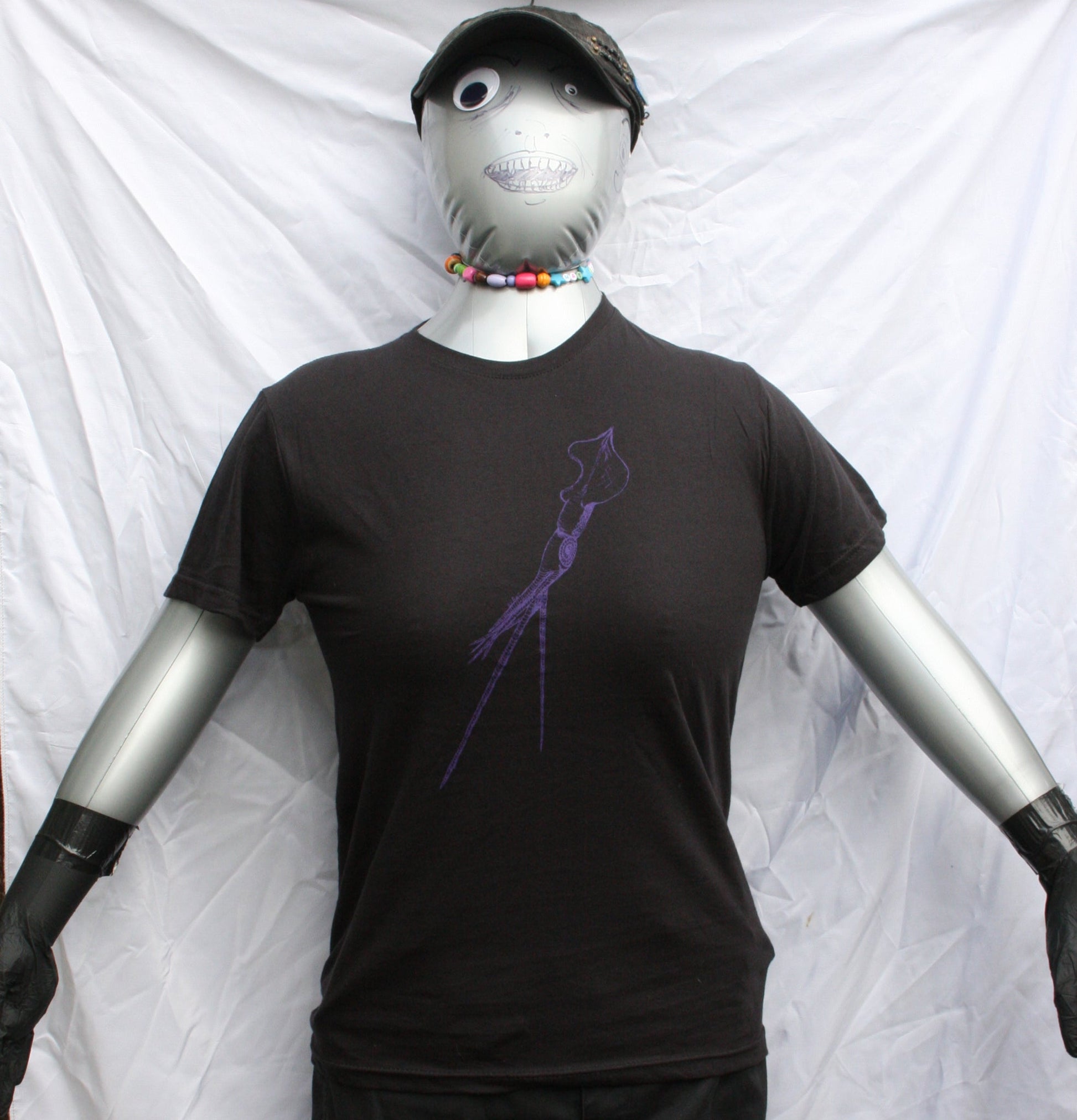 Black T-shirt featuring a hand-drawn whiplash squid design, with intricate tentacle details and artistic lines.