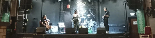 Throwing Muses Brudenell Social Club soundcheck, panoramic full band shot with white light reflected by ElRat Designs