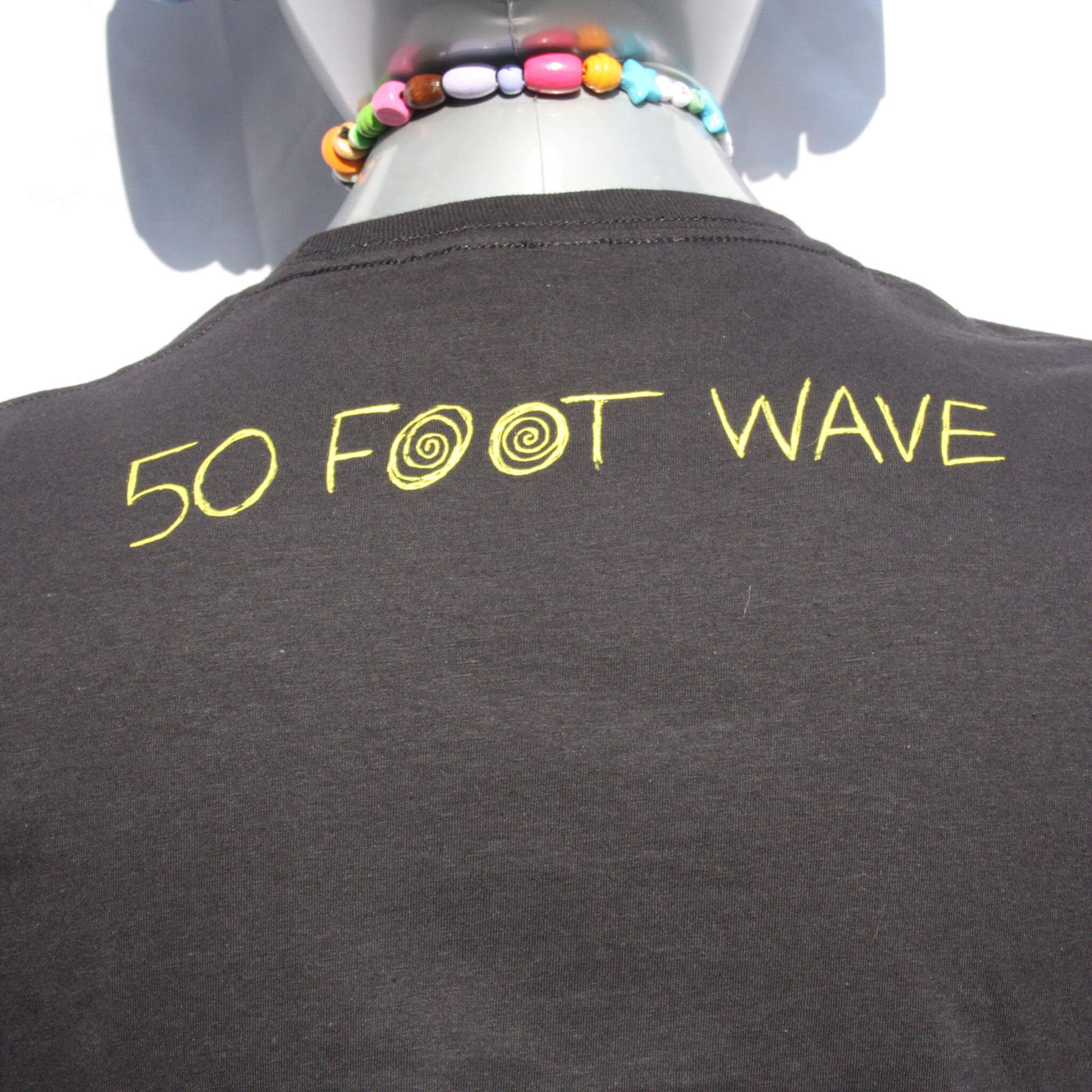 50 foot wave 'Sun Dog Coma' tee  - hand printed original by ElRat Designs on a black gildan softstyle shirt with bright yellow ink rear close up