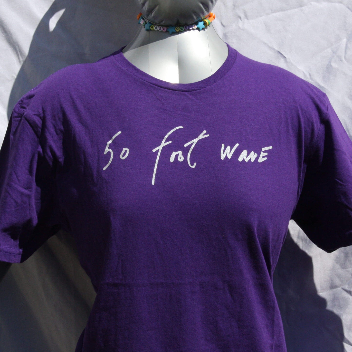 50 Foot Wave T-Shirt in purple featuring 'Throwing Muses' 2024 font, handwritten by Kristin Hersh, designed by ElRatDesigns