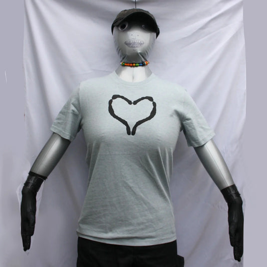 Mae Rose Owens wearing a Blue/Grey t-shirt with a black heart design, by ElRat Designs