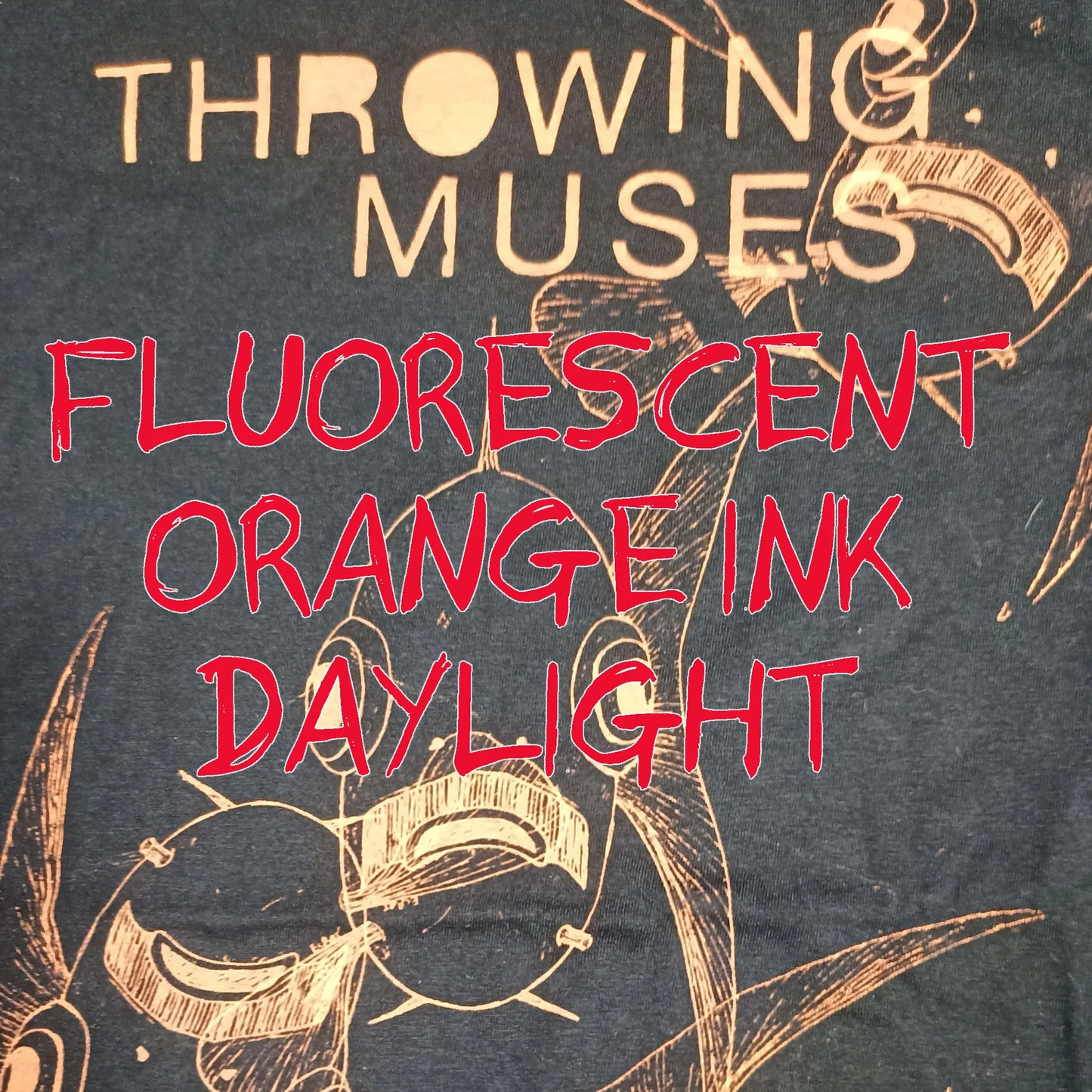 Throwing Muses bywater, schooling edition, messy print in Flourescent orange ink shown in daylight