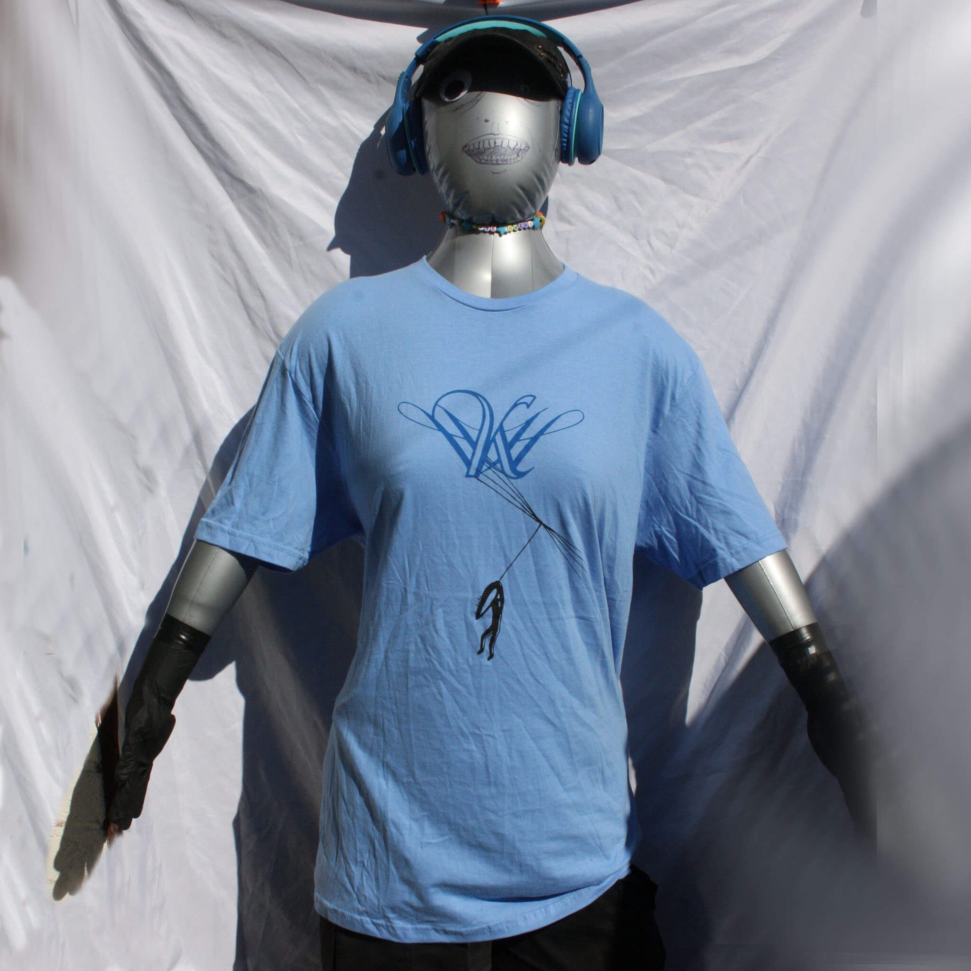 Dandelion Hope t-shirt with Kristin Hersh inspired design, screen printed on a comfortable cotton tee carolina blue full
