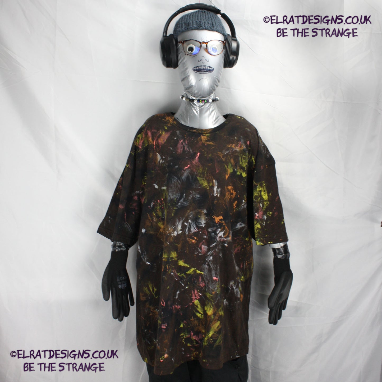 Messy Artist shirt from ElRat Designs - MA Bl RTD 2XL1 - One of a kind eco friendly art shirt. Made using waste ink. Black Shirt with Blue, Yellow and Fluorescent Orange, I think a bit of silver, likely some other colours. Please check the photos This is your shirt - hero - elratdesigns.co.uk