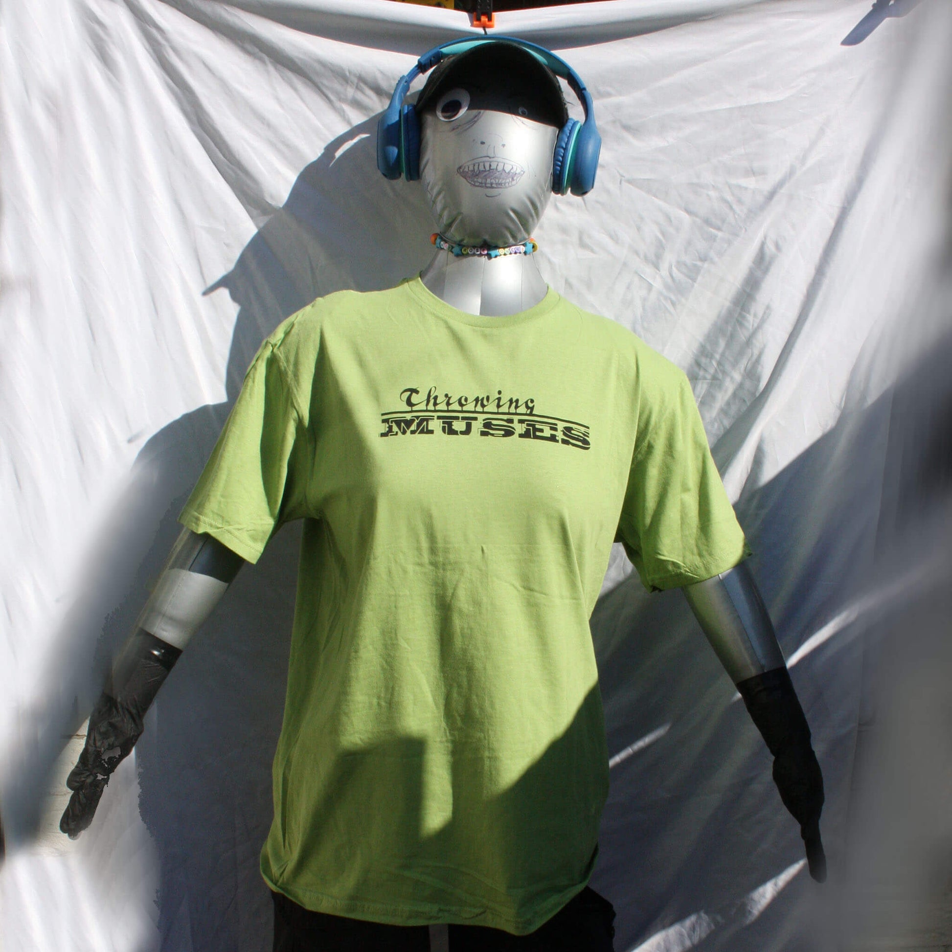 Gildan Softstyle kiwi green T-shirt, 100% cotton fabric, with Throwing Muses "University" logo in black Ink_full