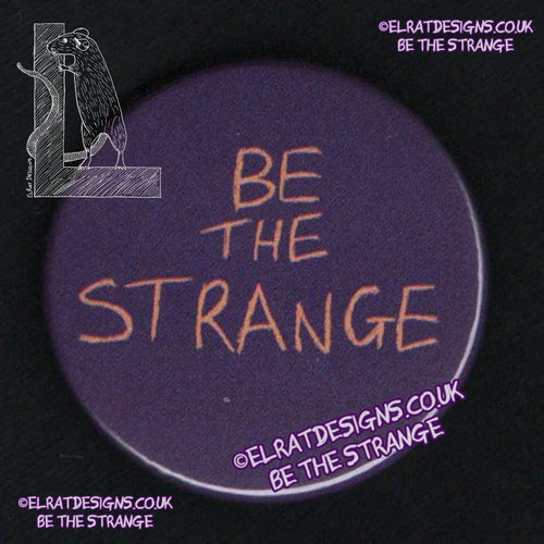 ElRat Original "Be the Strange" badge, 38mm metal backed. Purple/Orange. elratdesigns.co.uk