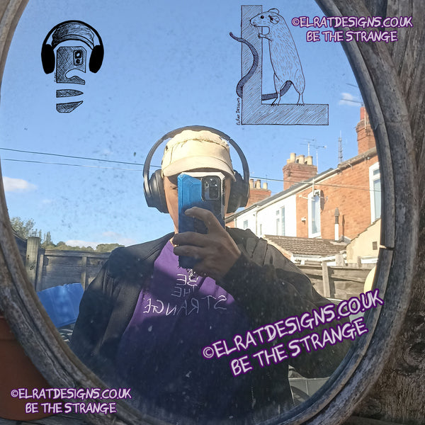 ElRat in the Mirror. ElRat Designs Be the Strange, and scrawled neurodiversity t-shirt - hero - elratdesigns.co.uk
