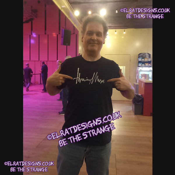 ElRat in the Wild, Black/white Throwing Muses 1986 logo T-Shirt, out in the wild at Throwing Muses Liverpool show. 23rd August 2025. ElRat Designs - hero - elratdesigns.co.uk 