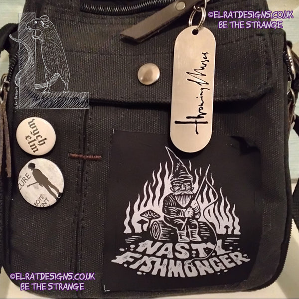 ElRat in the Wild. Throwing Muses 1986 logo CNC laser-cut stainless steel keyring, made in the UK from scrap for ElRat Designs on Nicola's very cool bag - hero - elratdesigns.co.uk