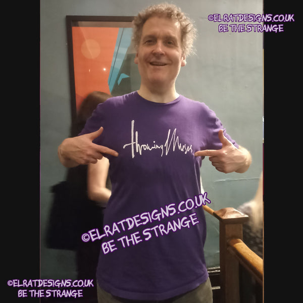 ElRat in the Wild, Purple/white Throwing Muses 1986 logo T-Shirt, out in the wild at Throwing Muses Hebden Bridge show. 25th August 2025. ElRat Designs - hero - elratdesigns.co.uk 