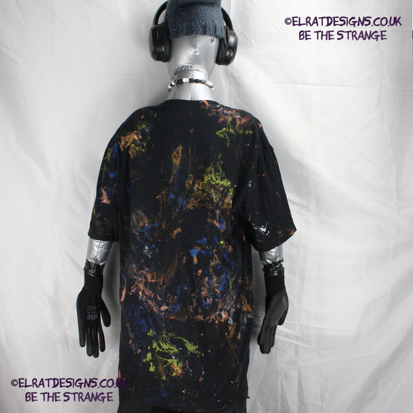 Messy Artist shirt from ElRat Designs - MA Bl L1 - One of a kind eco friendly art shirt. Made using waste ink. Black Shirt with Blue, Yellow and Fluorescent Orange, I think a bit of silver, likely some other colours. Please check the photos This is your shirt -  elratdesigns.co.uk