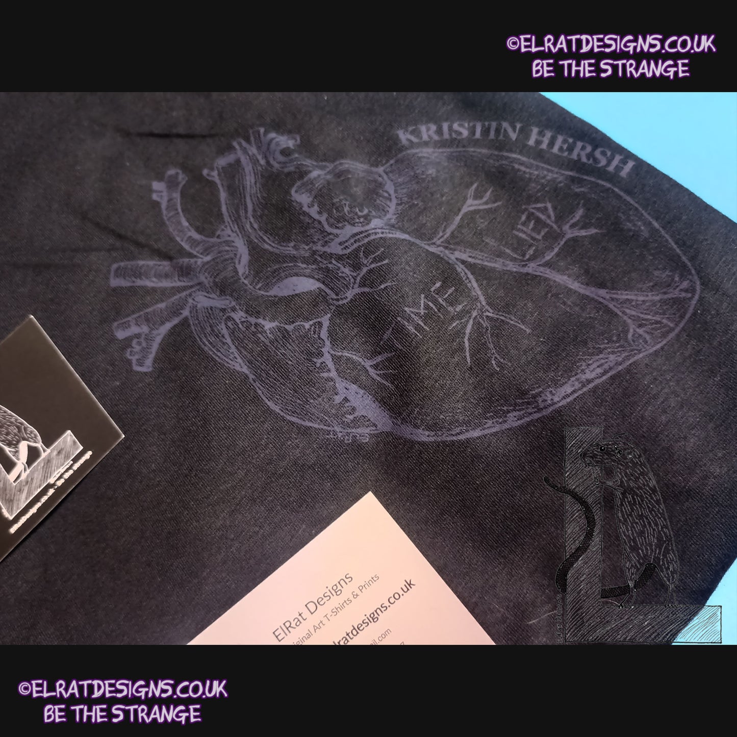 ElRat package of light 2, close up. Kristin Hersh - Reflections on the Motive Power of Fire, "Time Lied" anatomical heart T-shirt, Black Heart Edition, by ElRat designs - hero - elratdesigns.co.uk