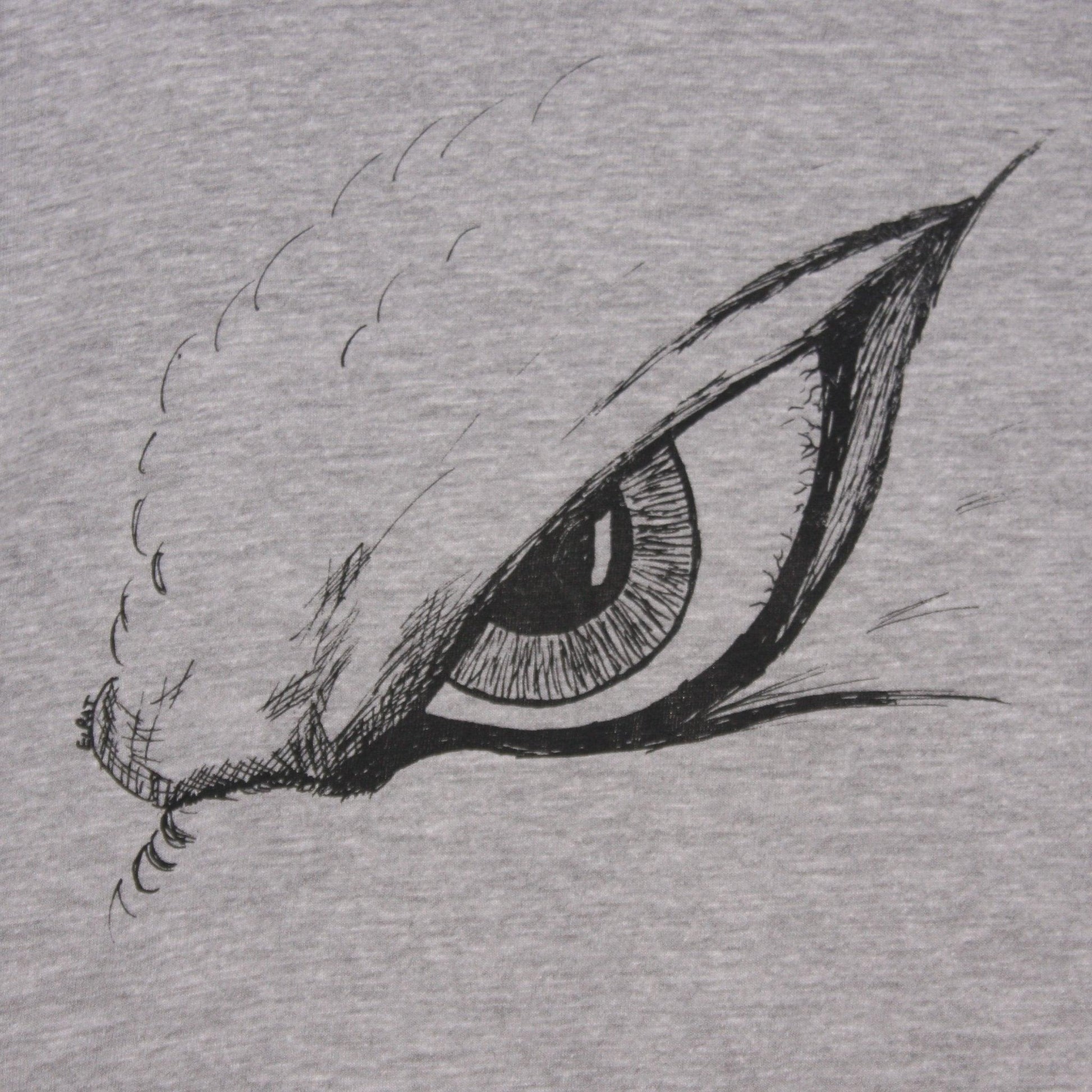 Hand-drawn Kaiju eye design on a screen-printed t-shirt, inspired by Japanese monster movies.