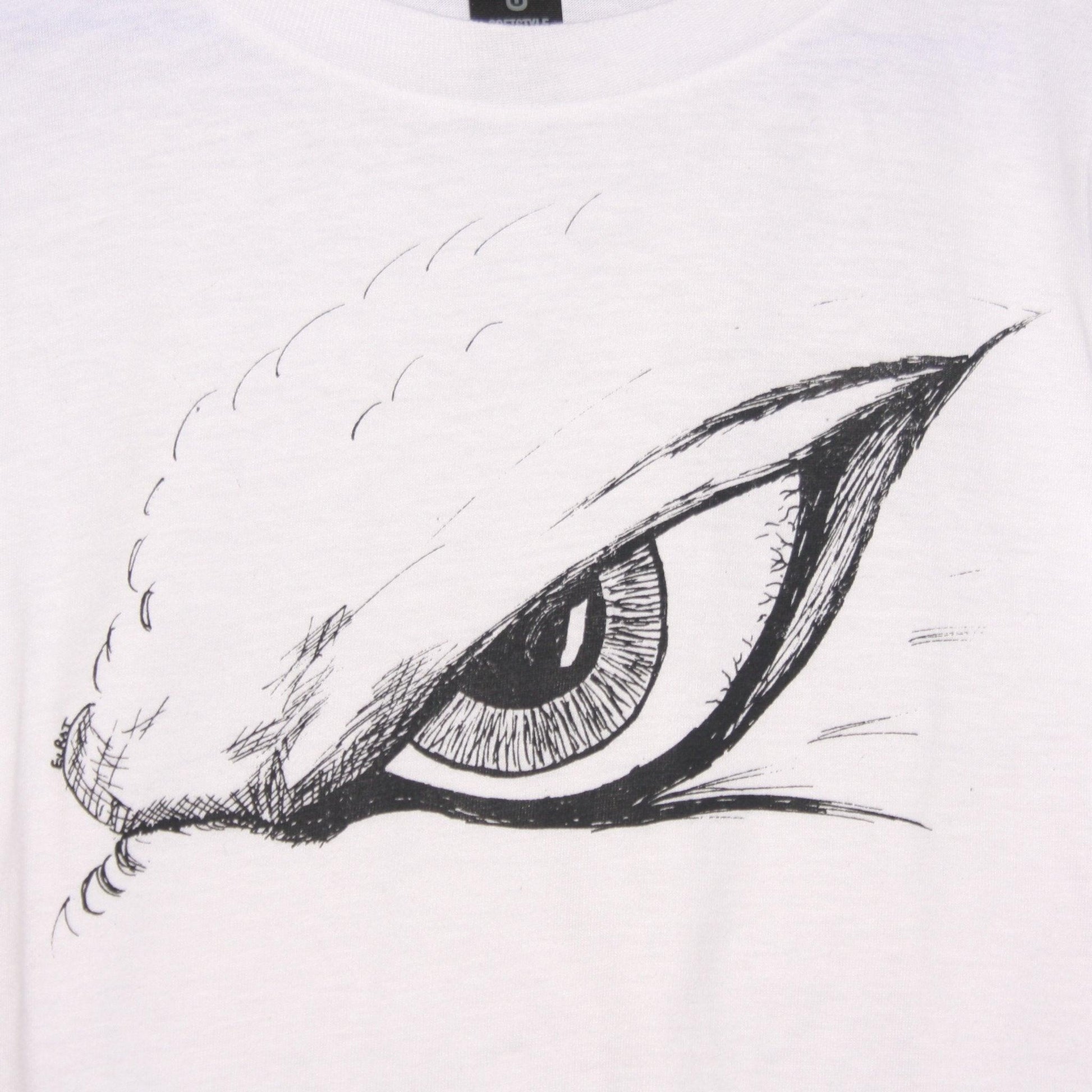 Hand-drawn Kaiju eye design on a screen-printed t-shirt, inspired by Japanese monster movies.