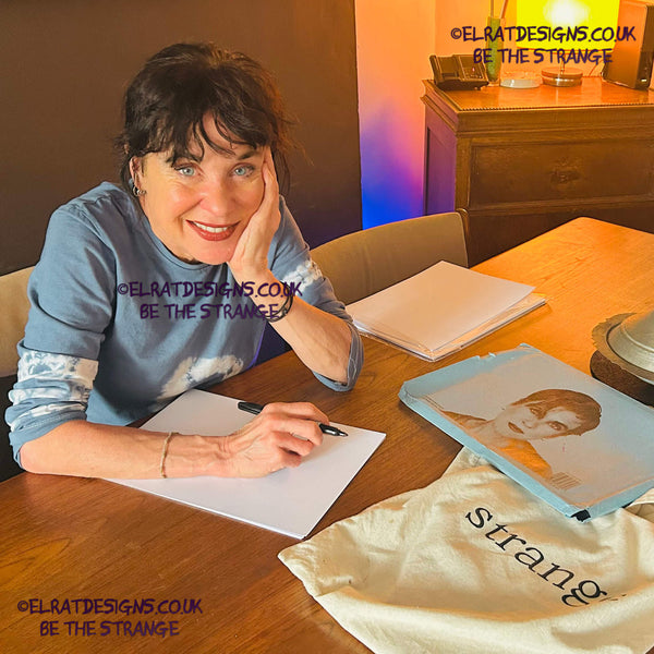 Kristin Hersh, handwriting lyrics in June 2025, while she was over in the UK on the Throwing Muses UK tour. She wrote these lyrics especially for ElRat Designs to bring you these exclusive T-Shirts. Only Available from ElRat Designs - hero -elratdesigns.co.uk