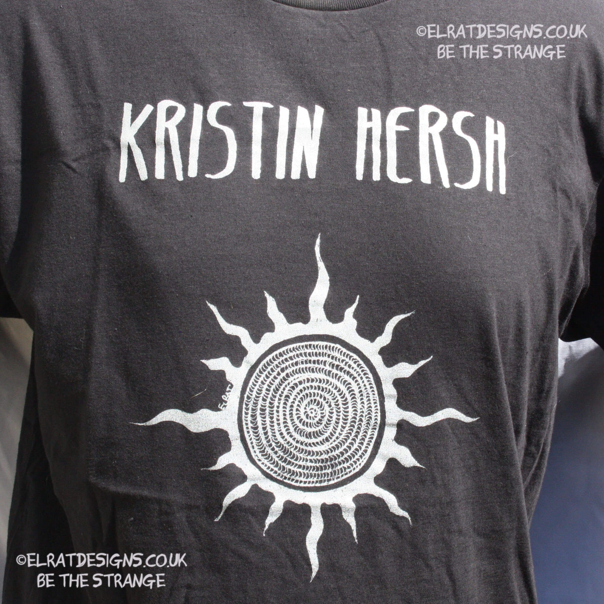 Kristin Hersh, Silver Sun, ElRat hand drawn Spiral sun printed in Silver, Back Print "How much for a life you don't despise?". hand pulled screen print with eco friendly water based ink. only from elratdesigns.co.uk