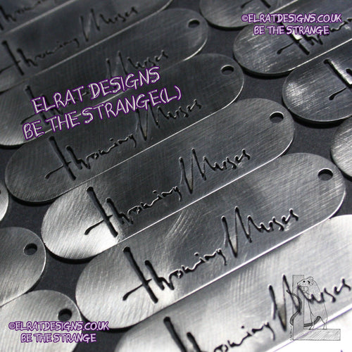 Throwing Muses 1986 logo CNC laser-cut stainless steel keyring, made in the UK from scrap for ElRat Designs - elratdesigns.co.uk