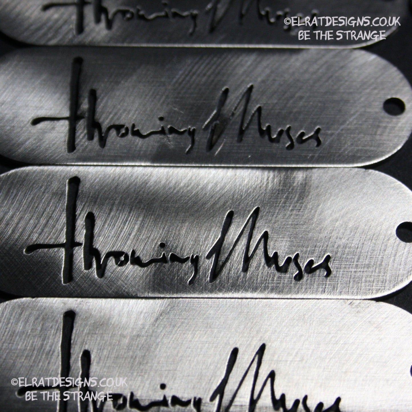 Throwing Muses 1986 logo CNC laser-cut stainless steel keyring, made in the UK from scrap for ElRat Designs - elratdesigns.co.uk