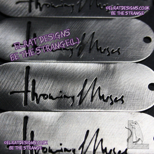 Throwing Muses 1986 logo CNC laser-cut stainless steel keyring, made in the UK from scrap for ElRat Designs - hero - elratdesigns.co.uk