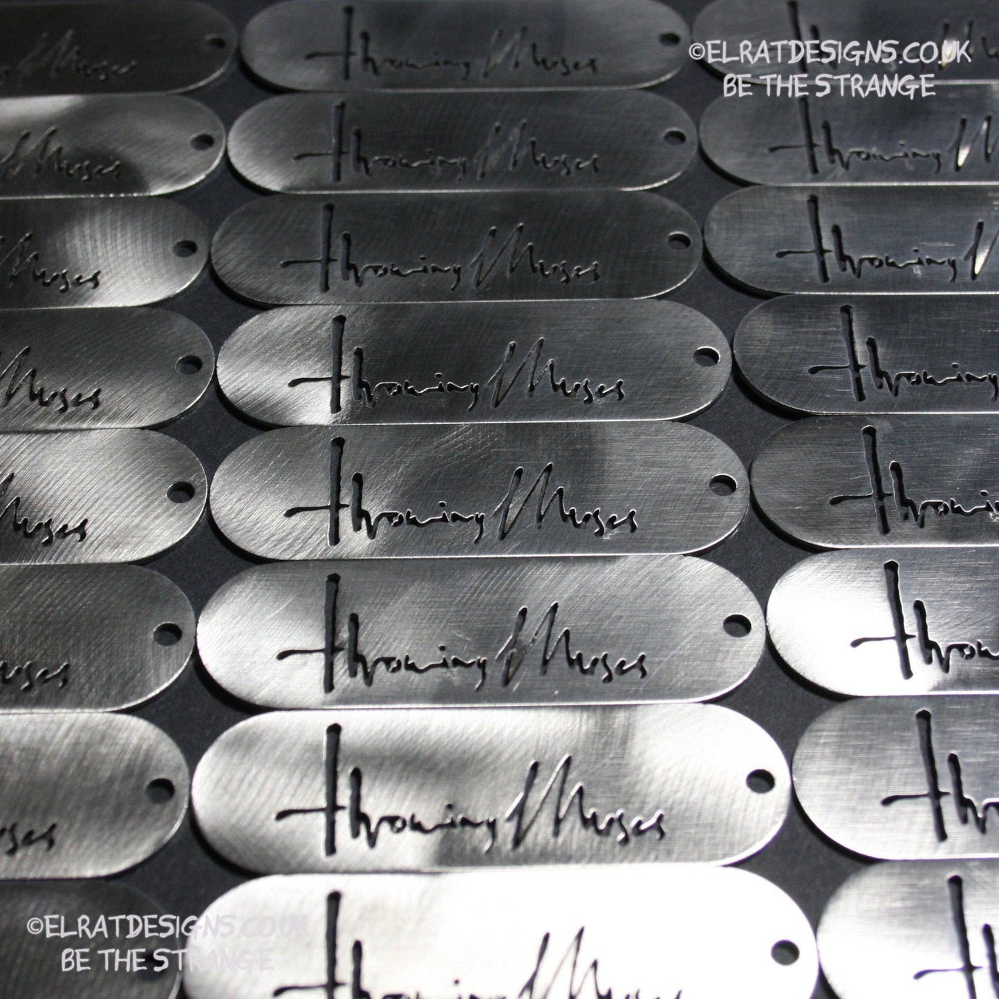 Throwing Muses 1986 logo CNC laser-cut stainless steel keyring, made in the UK from scrap for ElRat Designs - elratdesigns.co.uk