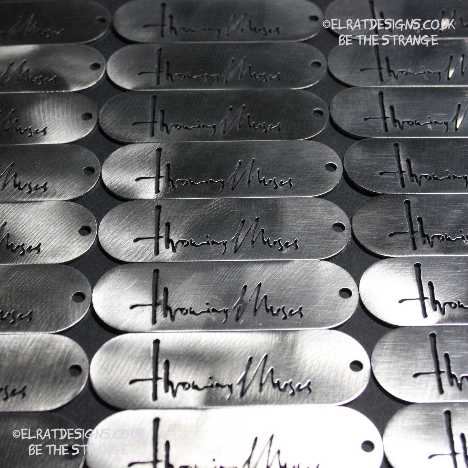 Throwing Muses 1986 logo CNC laser-cut stainless steel keyring, made in the UK from scrap for ElRat Designs - elratdesigns.co.uk