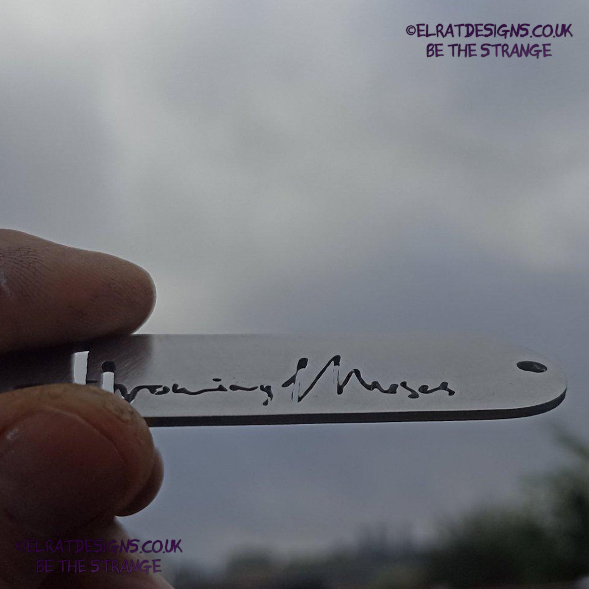 Throwing Muses 1986 logo CNC laser-cut stainless steel keyring, made in the UK from scrap for ElRat Designs - elratdesigns.co.uk