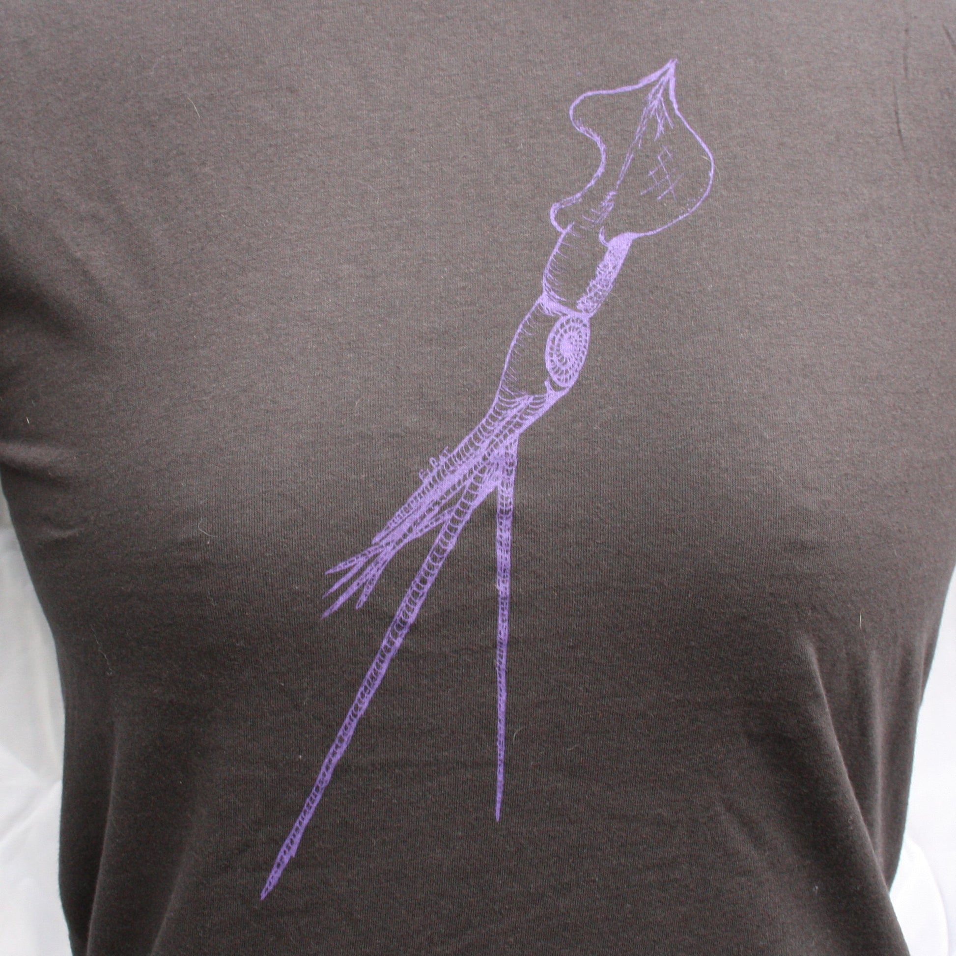 Black T-shirt featuring a hand-drawn whiplash squid design, with intricate tentacle details and artistic lines.